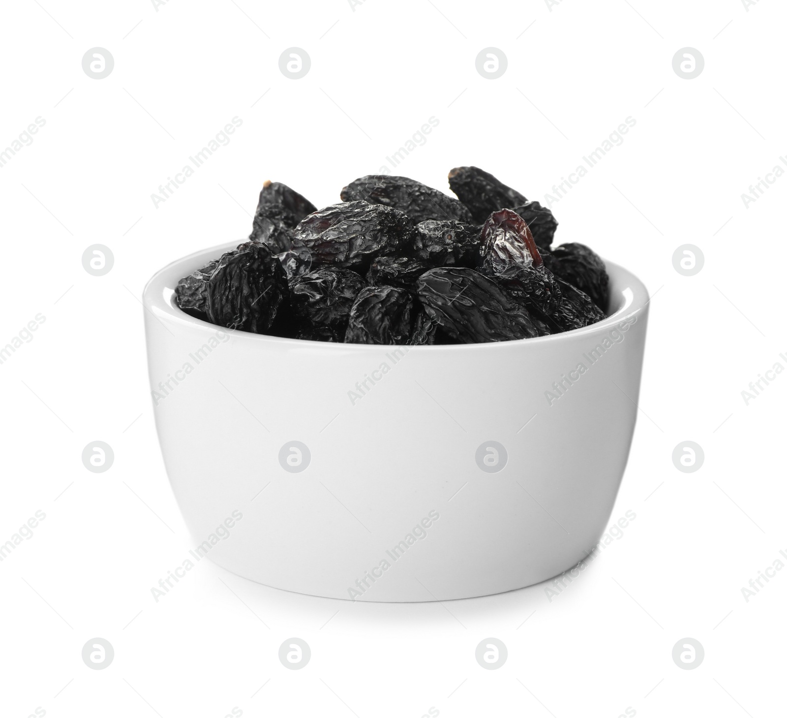 Photo of Bowl with raisins on white background. Healthy dried fruit