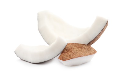 Photo of Pieces of ripe coconut on white background