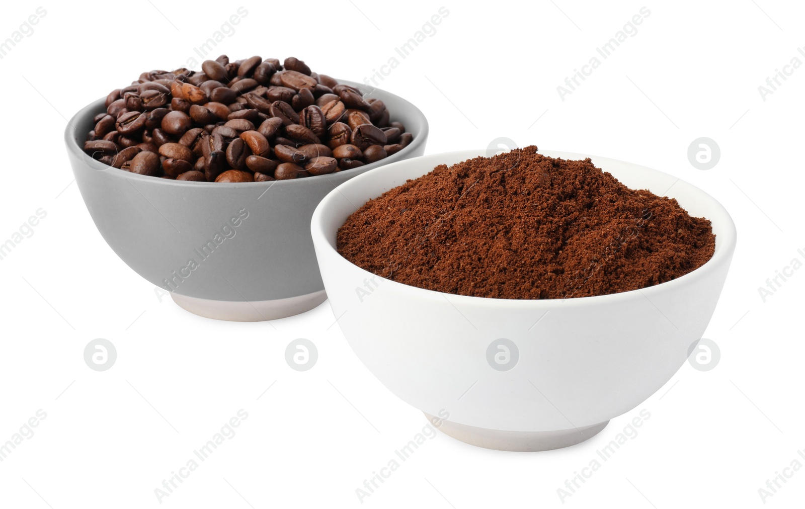 Photo of Bowls with ground coffee and roasted beans on white background