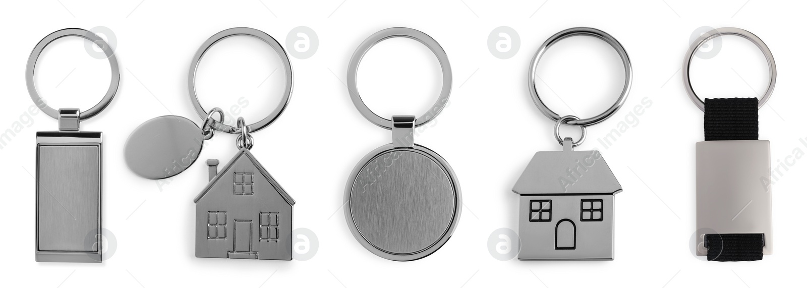 Image of Set of metal key chains in different shapes isolated on white