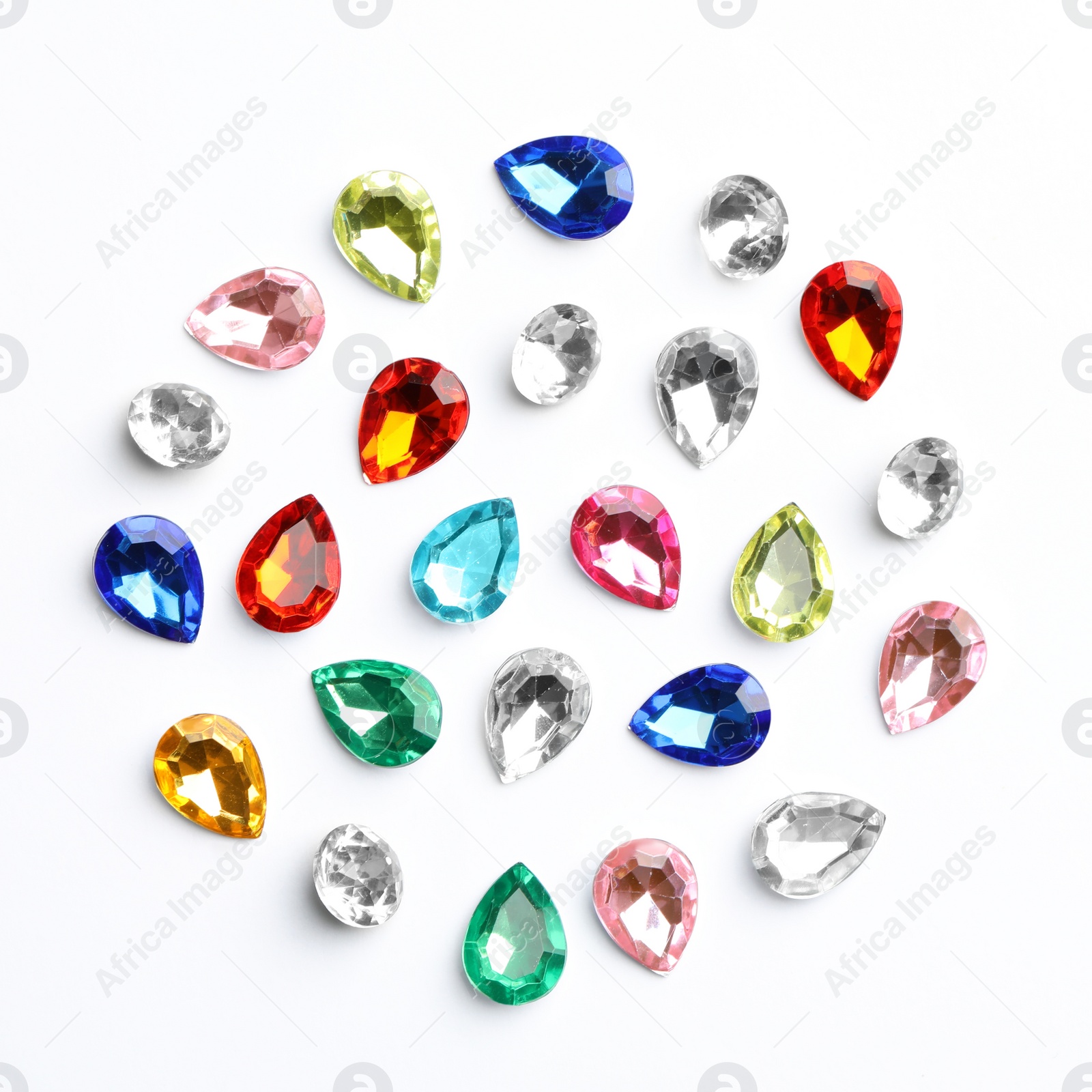 Image of Different beautiful gemstones on white background, top view