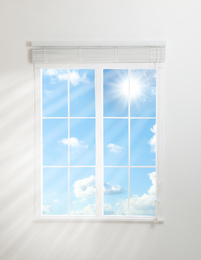 Image of Beautiful view on blue sky with clouds through window