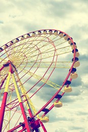 Beautiful large Ferris wheel outdoors, low angle view