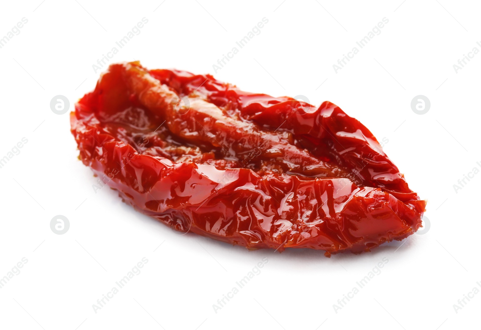 Photo of Tasty sun dried tomato on white background