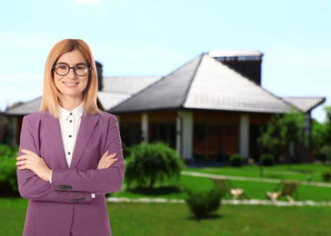 Image of Real estate agent against modern house with garden. Space for text