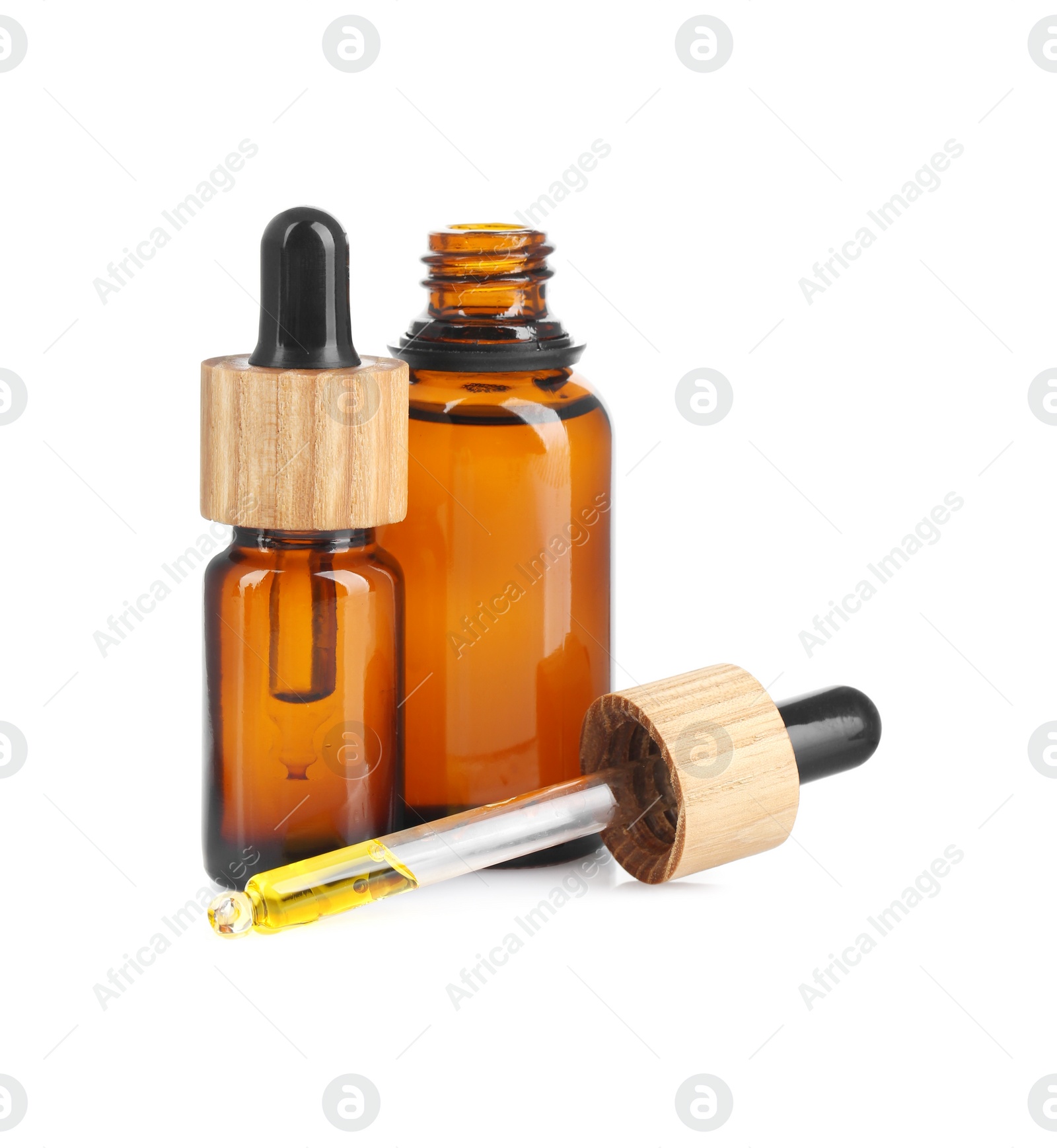 Photo of Glass bottles and pipette with tincture isolated on white