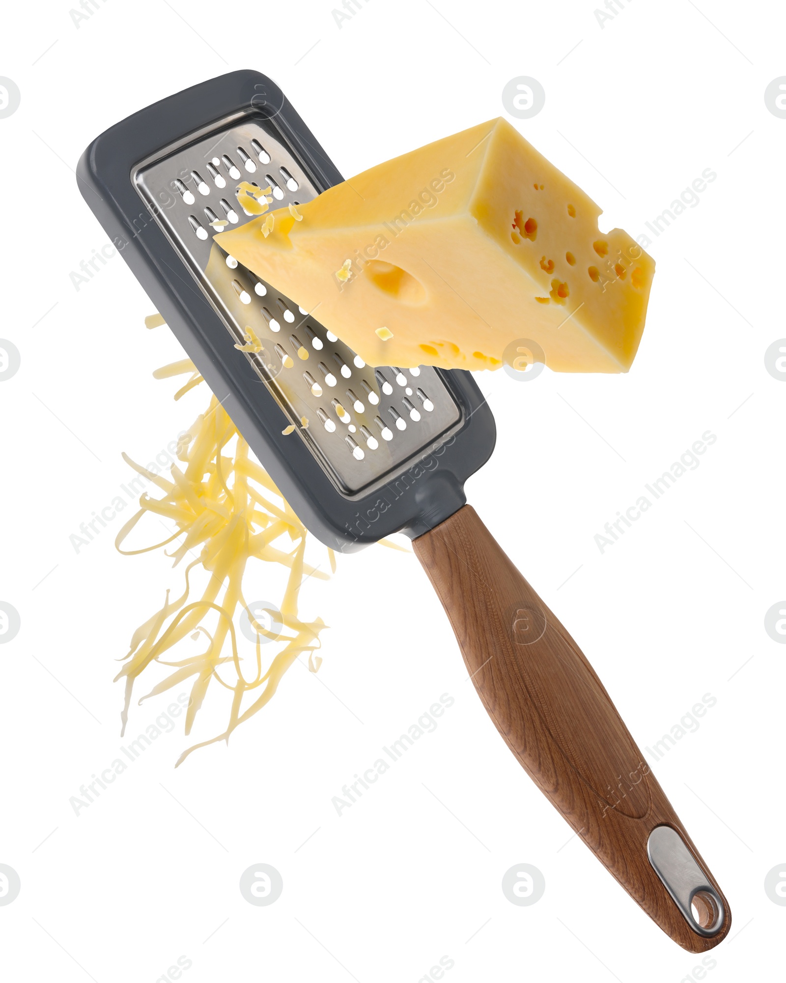 Image of Grating cheese with hand grater in air on white background