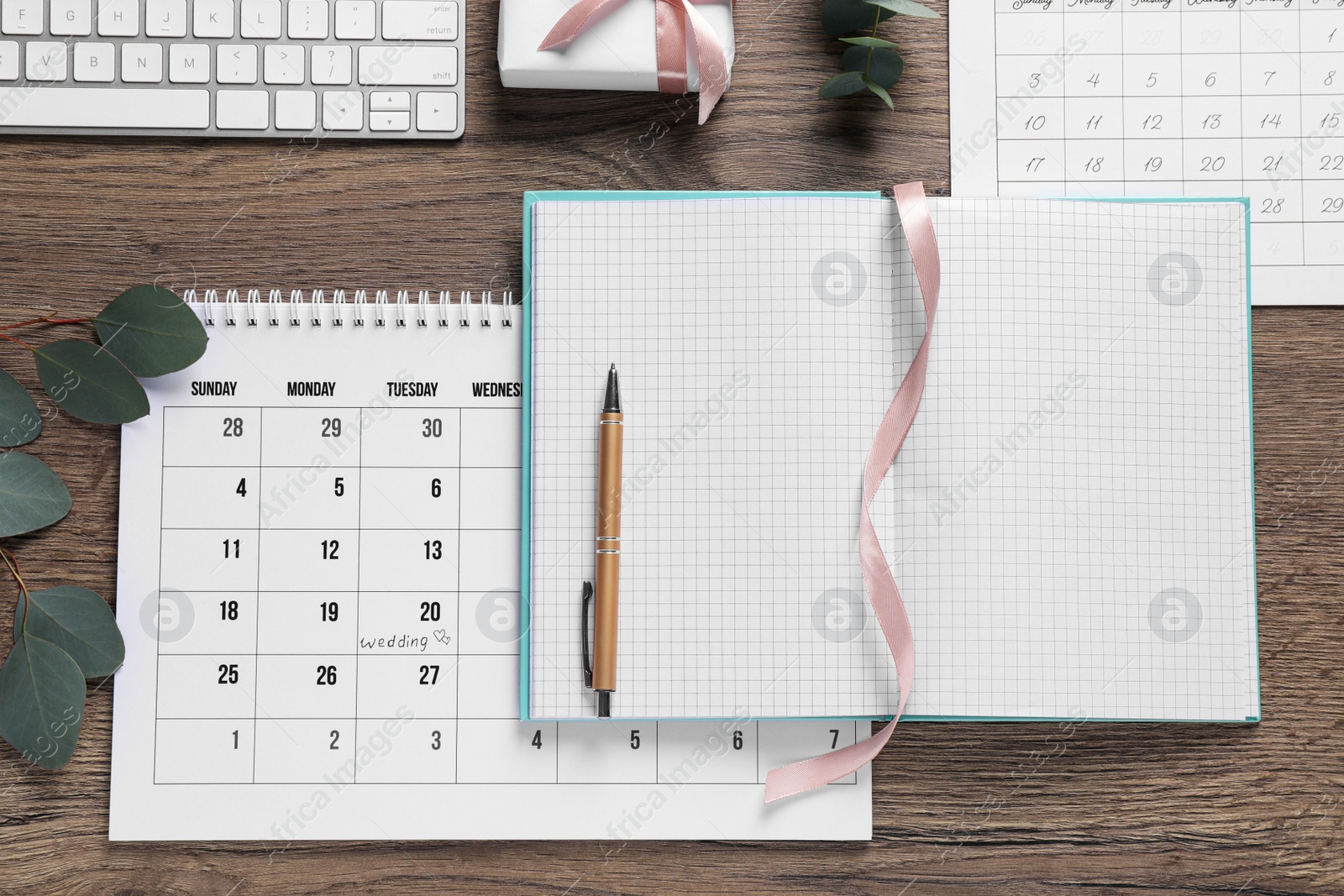 Photo of Flat lay composition with Wedding Planner on wooden table