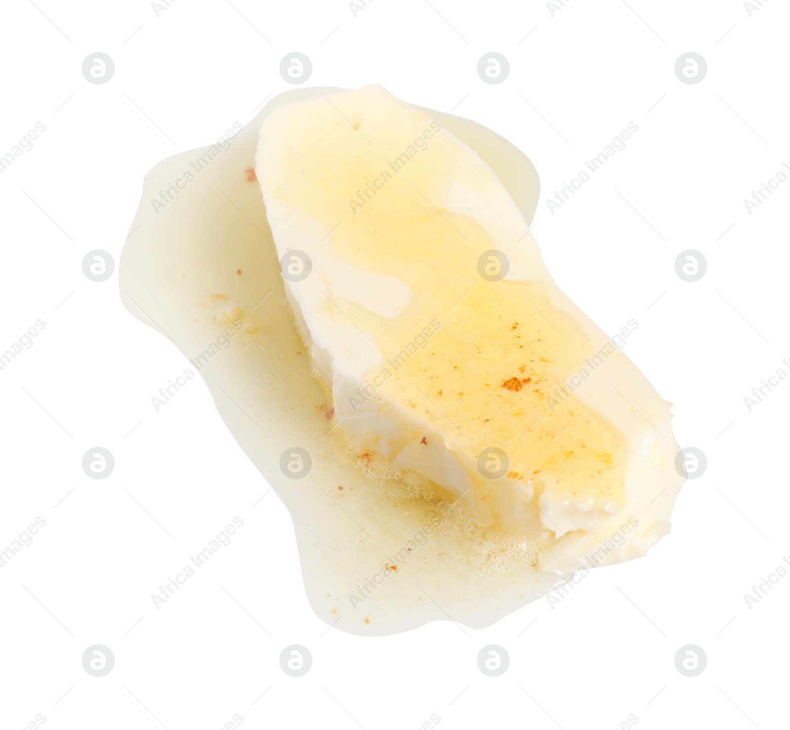 Photo of Piece of melting butter on white background