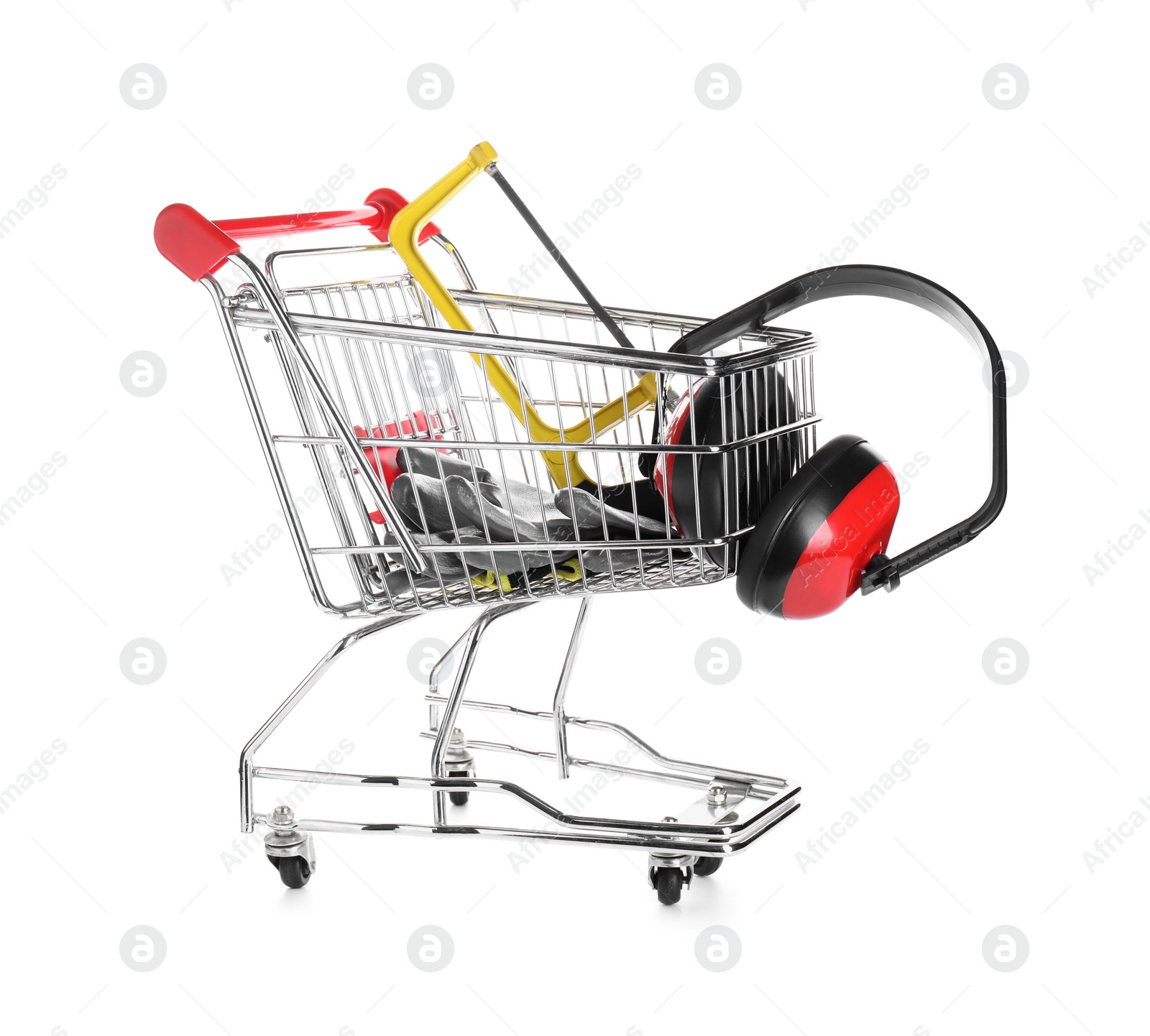 Photo of Small shopping cart with hacksaw, gloves and headphones isolated on white