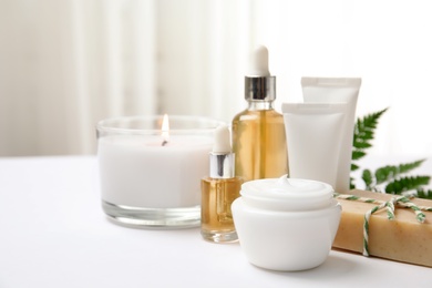 Composition with different body care products on table. Mockup for design