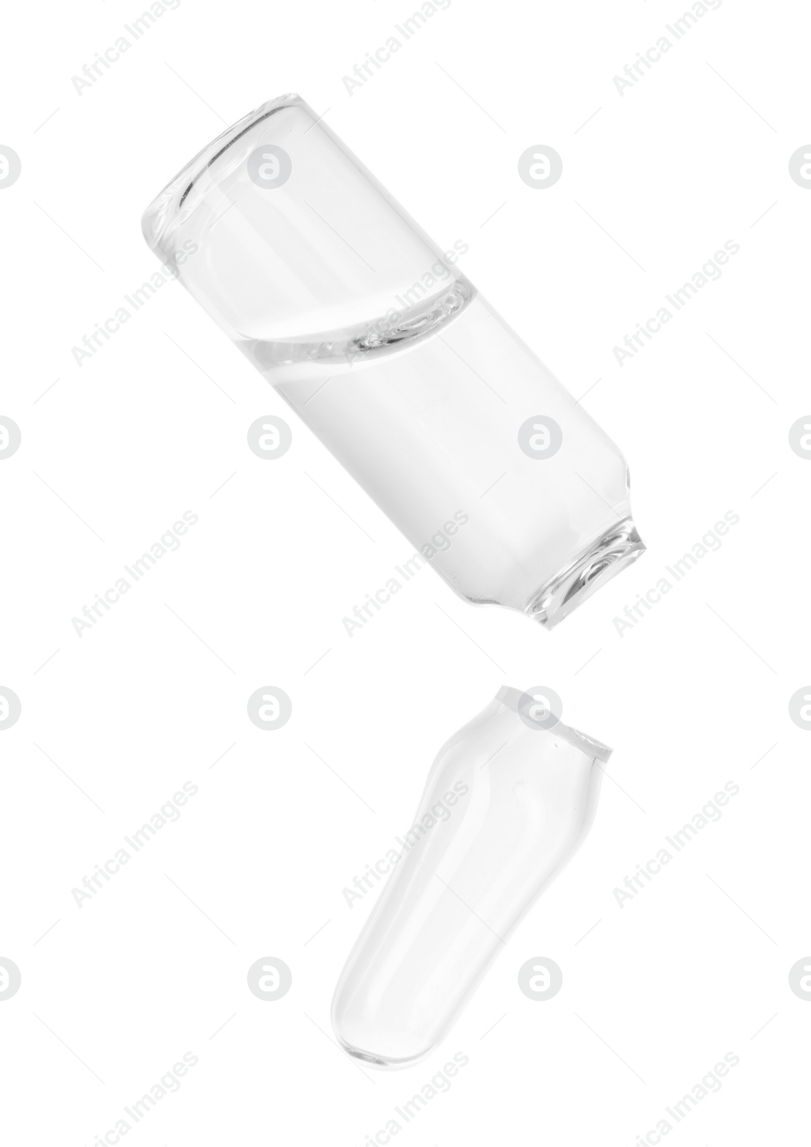 Photo of Open glass ampoule with liquid isolated on white