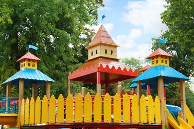 Photo of New colorful castle playhouse on children's playground