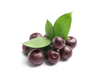 Fresh acai berries with leaves on white background