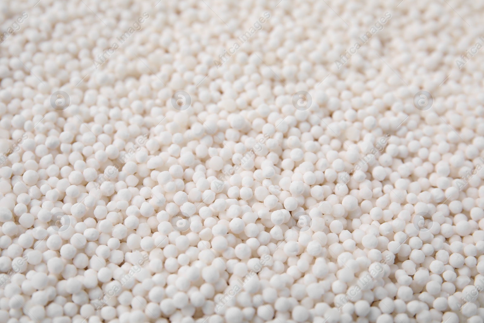 Photo of White tapioca pearls as background, closeup view