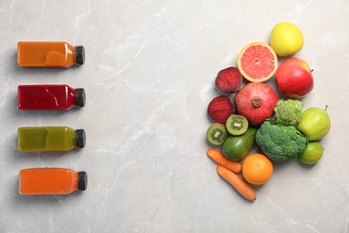 Photo of Flat lay composition with healthy detox smoothies and ingredients on light background