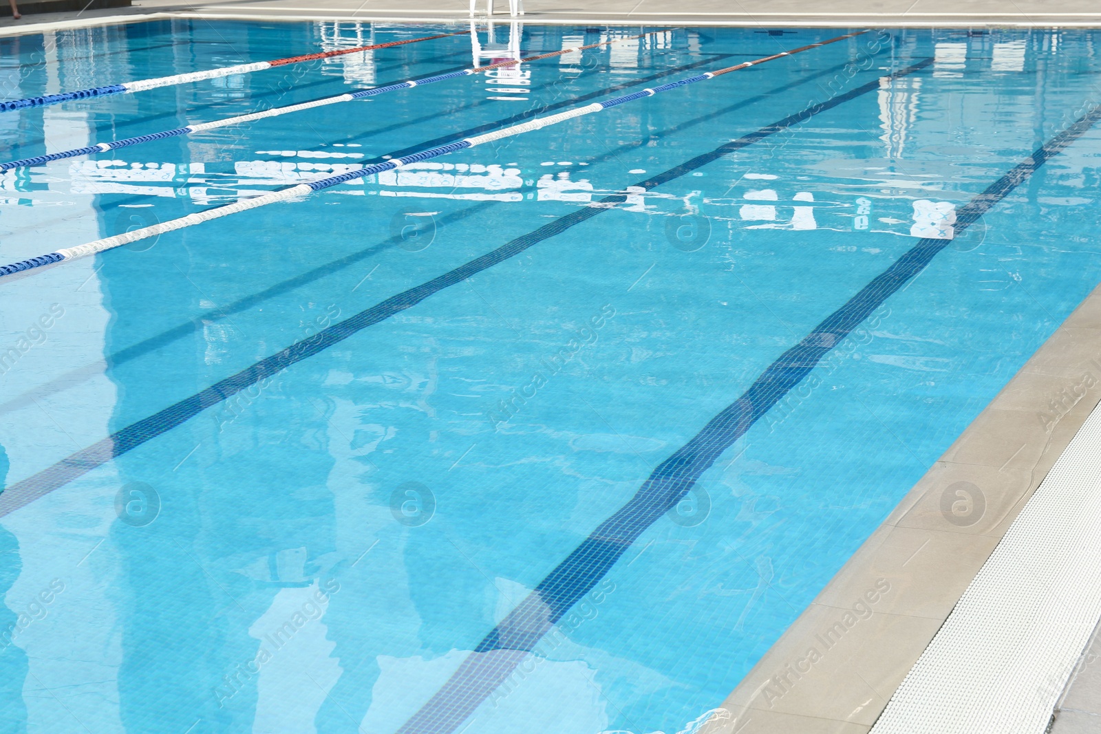 Photo of Outdoor swimming pool with clear water at luxury resort