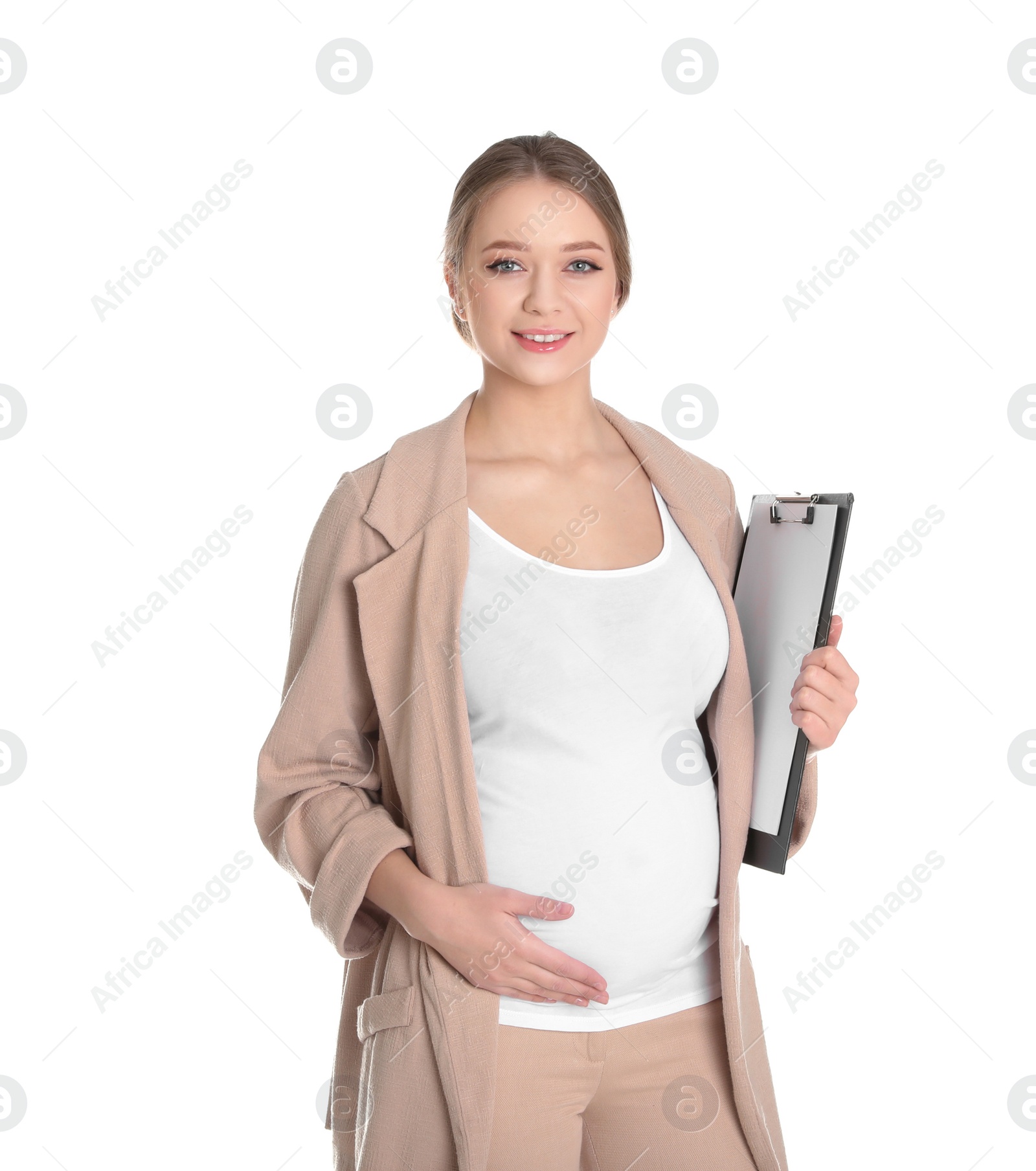 Photo of Young pregnant woman in suit with clipboard on white background. Working while expecting baby