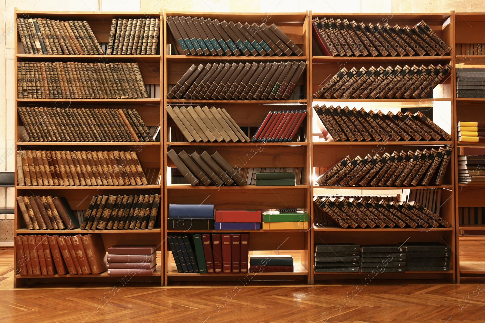 Image of Collection of different books on shelves in library