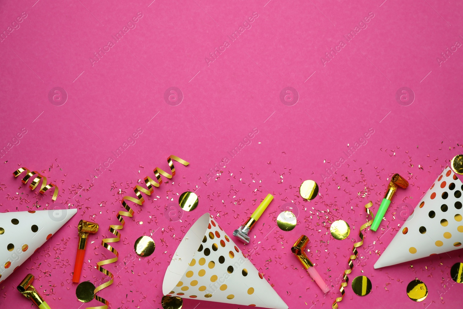 Photo of Flat lay composition with party items on pink background, space for text