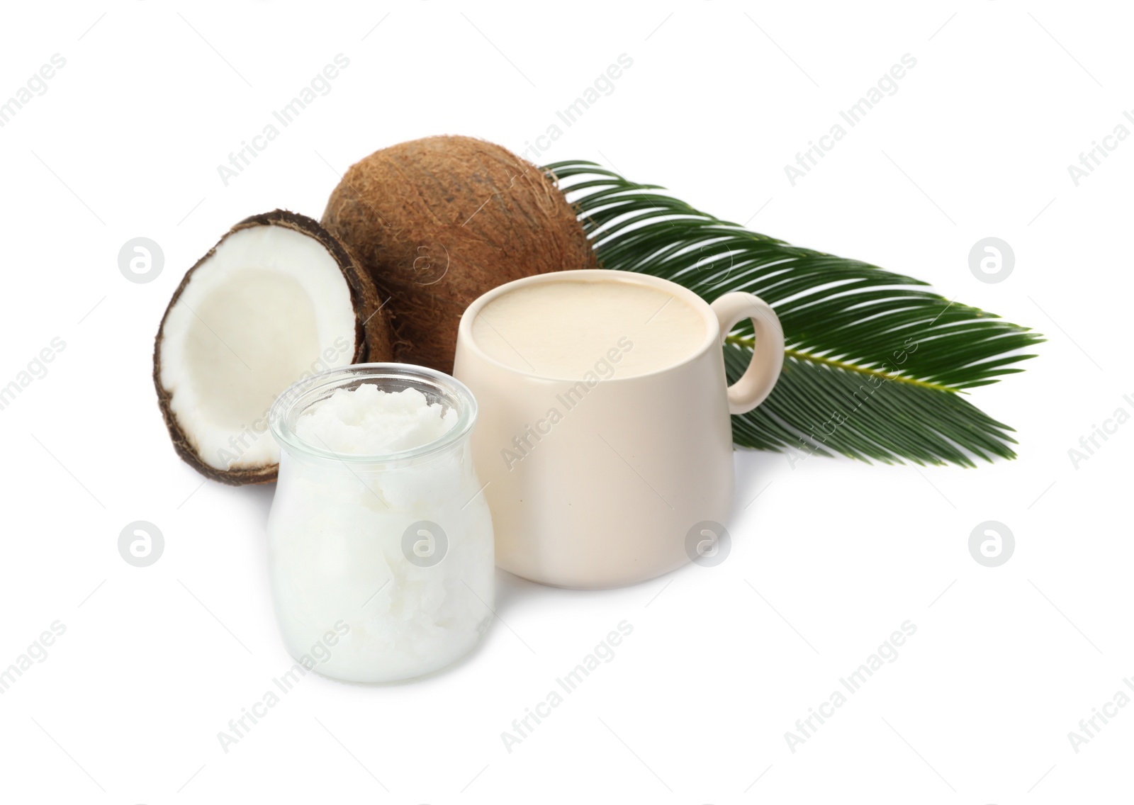 Photo of Delicious coffee with organic coconut oil and palm leaf isolated on white