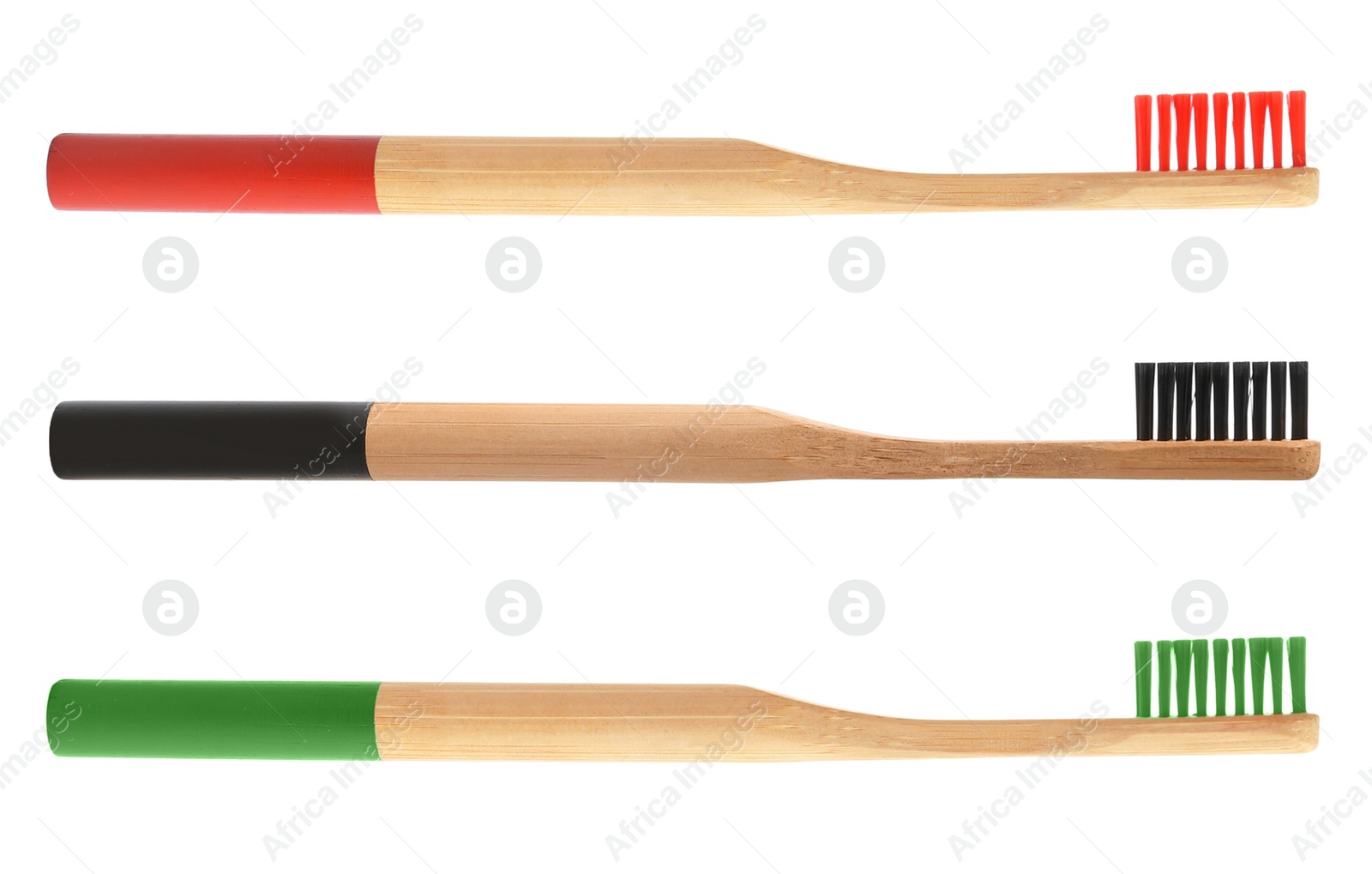 Image of Set of bamboo toothbrushes on white background 