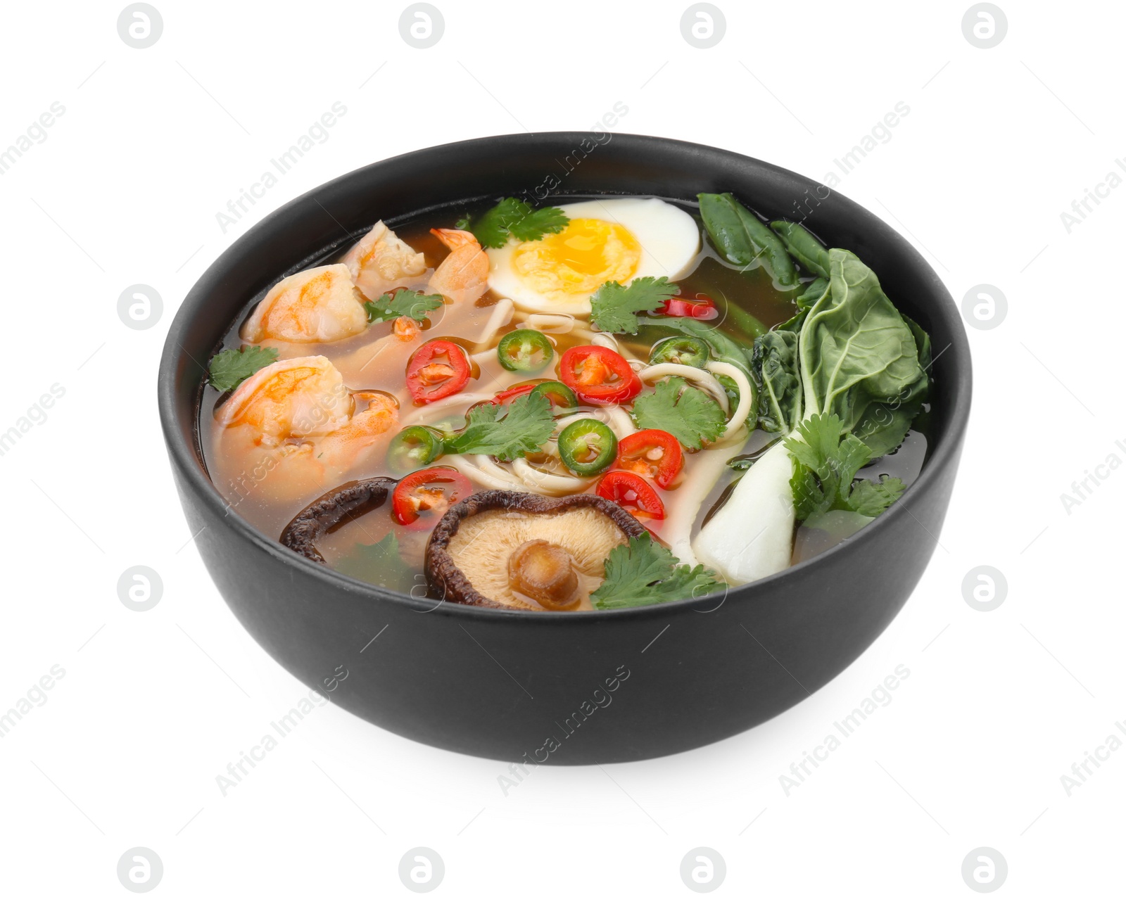 Photo of Delicious ramen with shrimps and egg in bowl isolated on white. Noodle soup