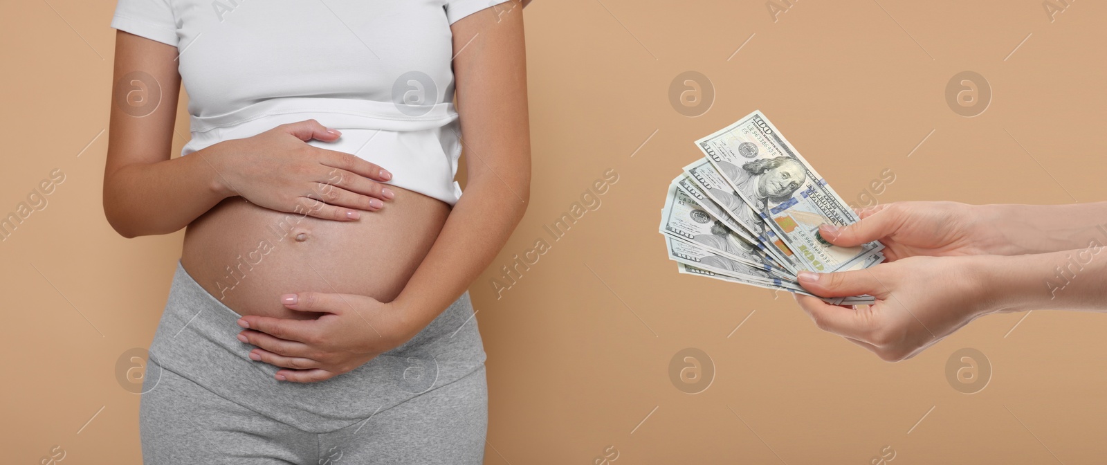 Image of Surrogacy. Intended mother with money and pregnant woman on beige background, closeup. Banner design