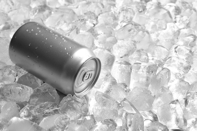 Tin can on pile of ice cubes