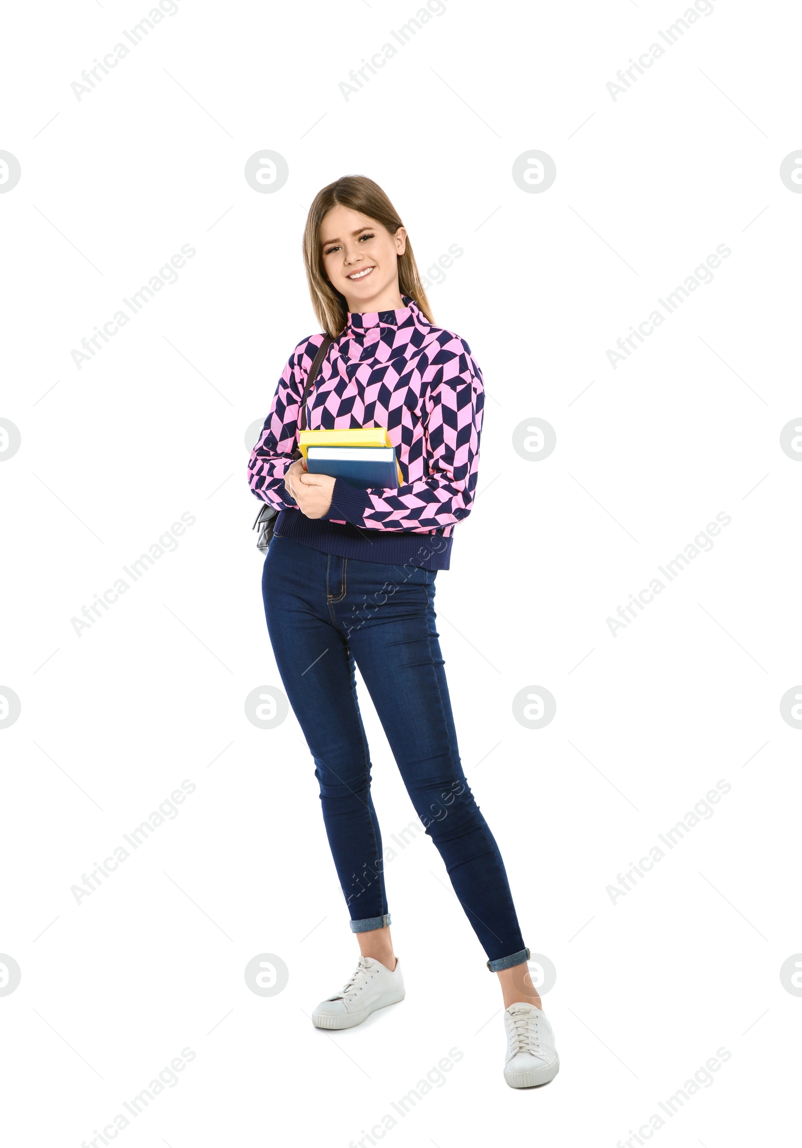 Photo of Beautiful teenager girl with books on white background