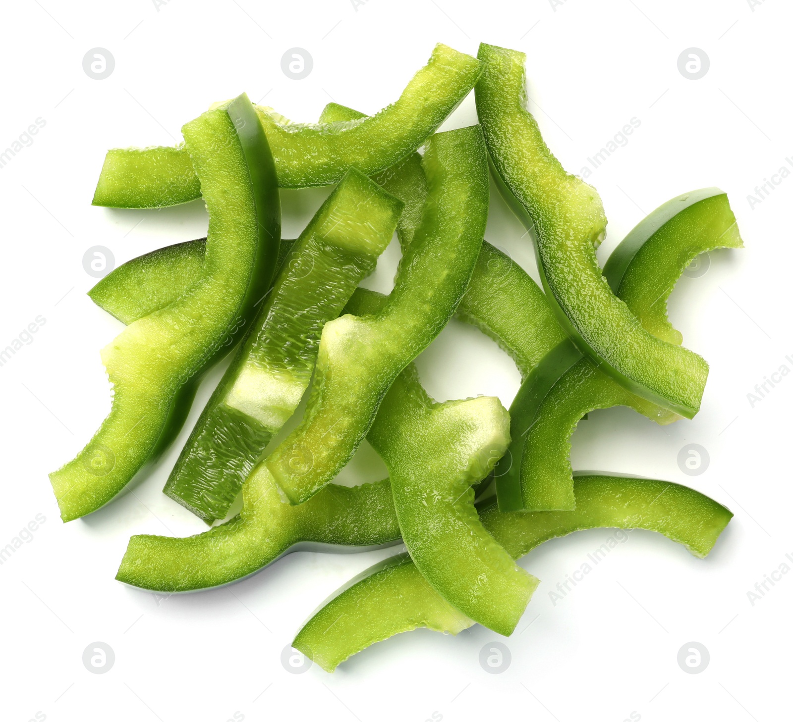 Photo of Pile of green bell pepper slices on white background, top view