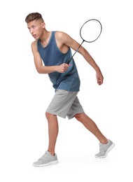 Photo of Young man playing badminton with racket on white background