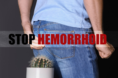 Image of Man sitting on cactus against black background, closeup. Stop hemorrhoid