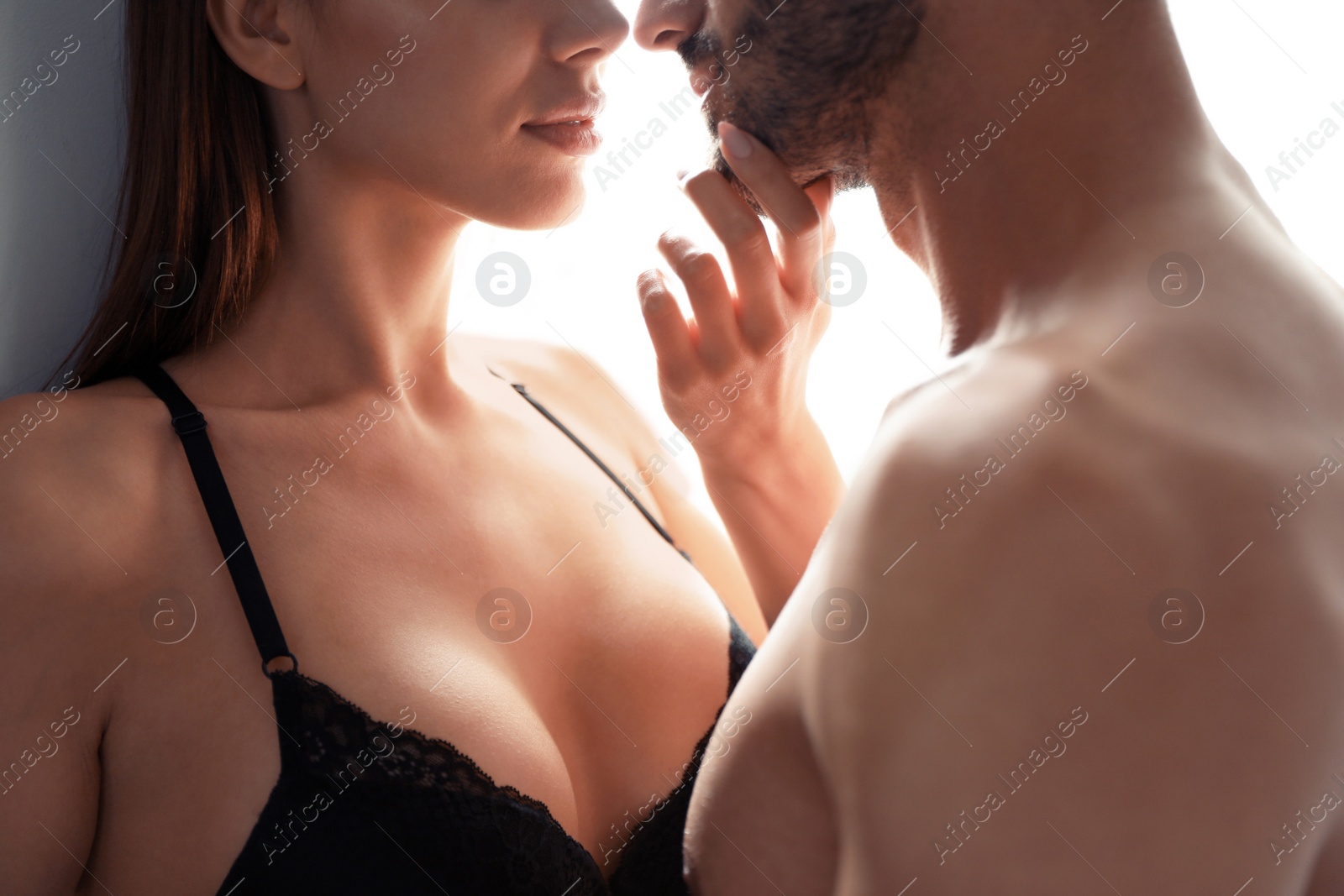 Photo of Passionate young couple having sex at home, closeup