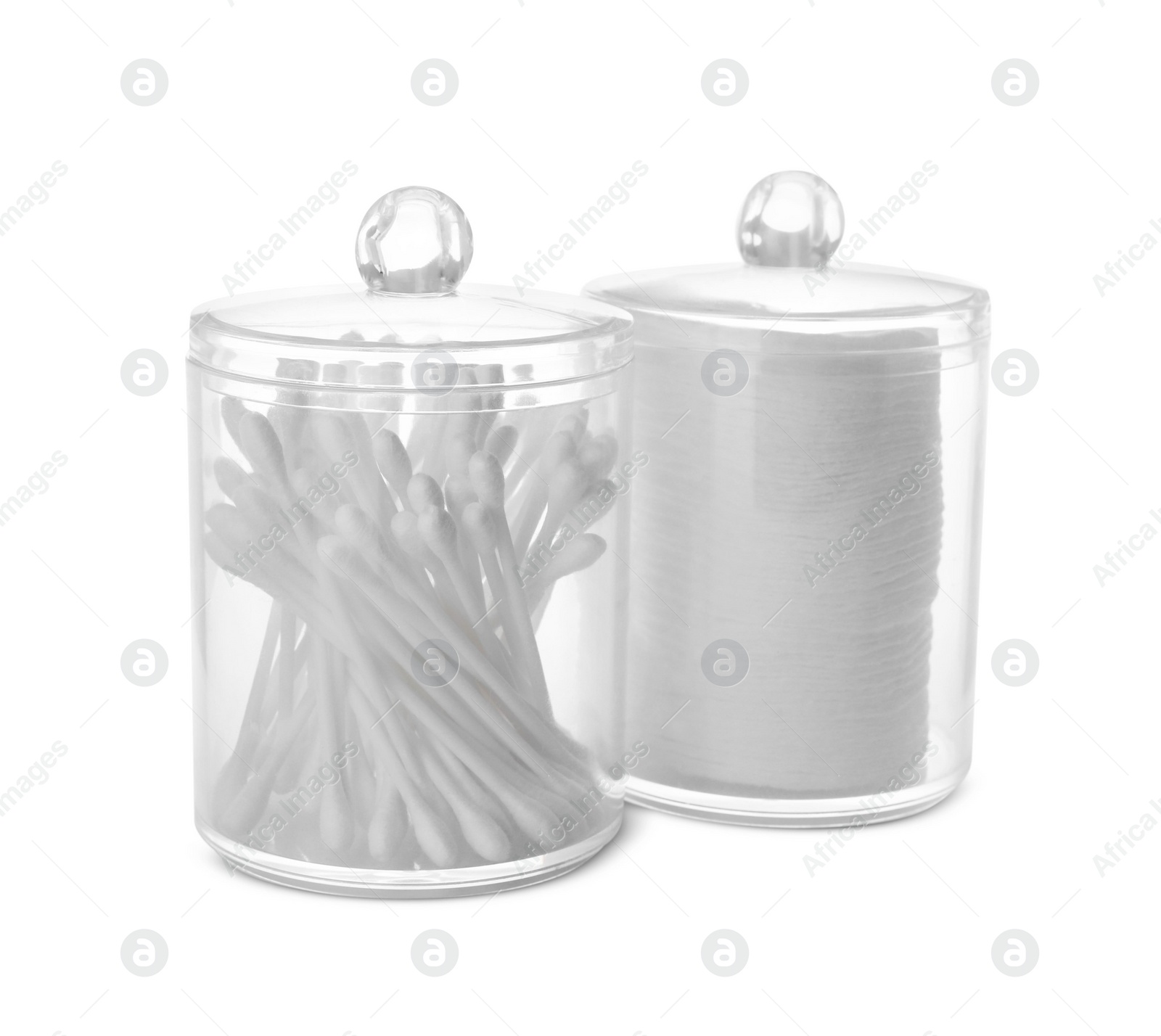 Photo of Cotton pads and swabs in plastic jars on white background