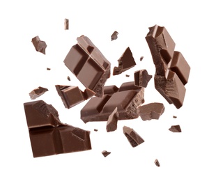 Image of Milk chocolate pieces falling on white background
