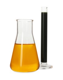 Photo of Test tube and flask with different types of oil isolated on white