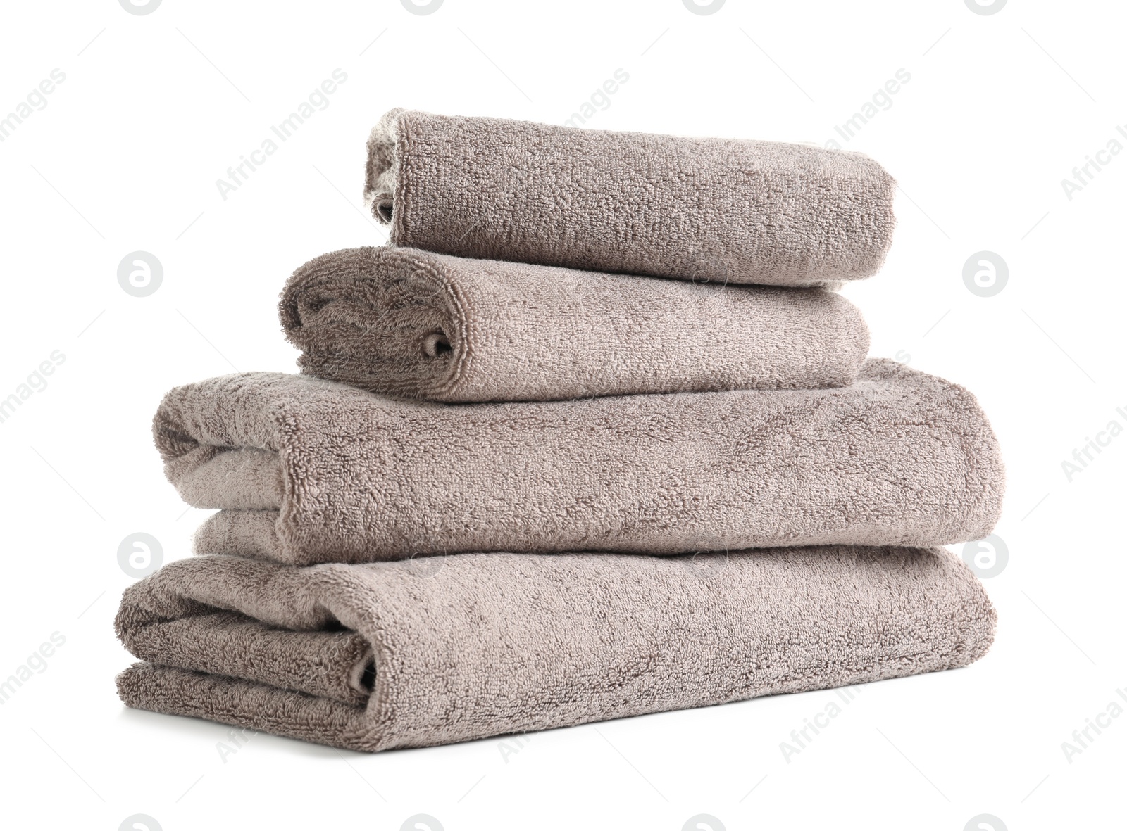 Photo of Stack of fresh towels isolated on white