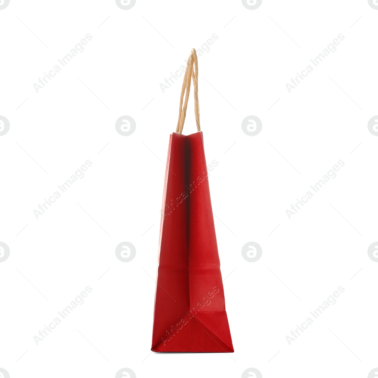 Photo of Empty paper shopping bag on white background