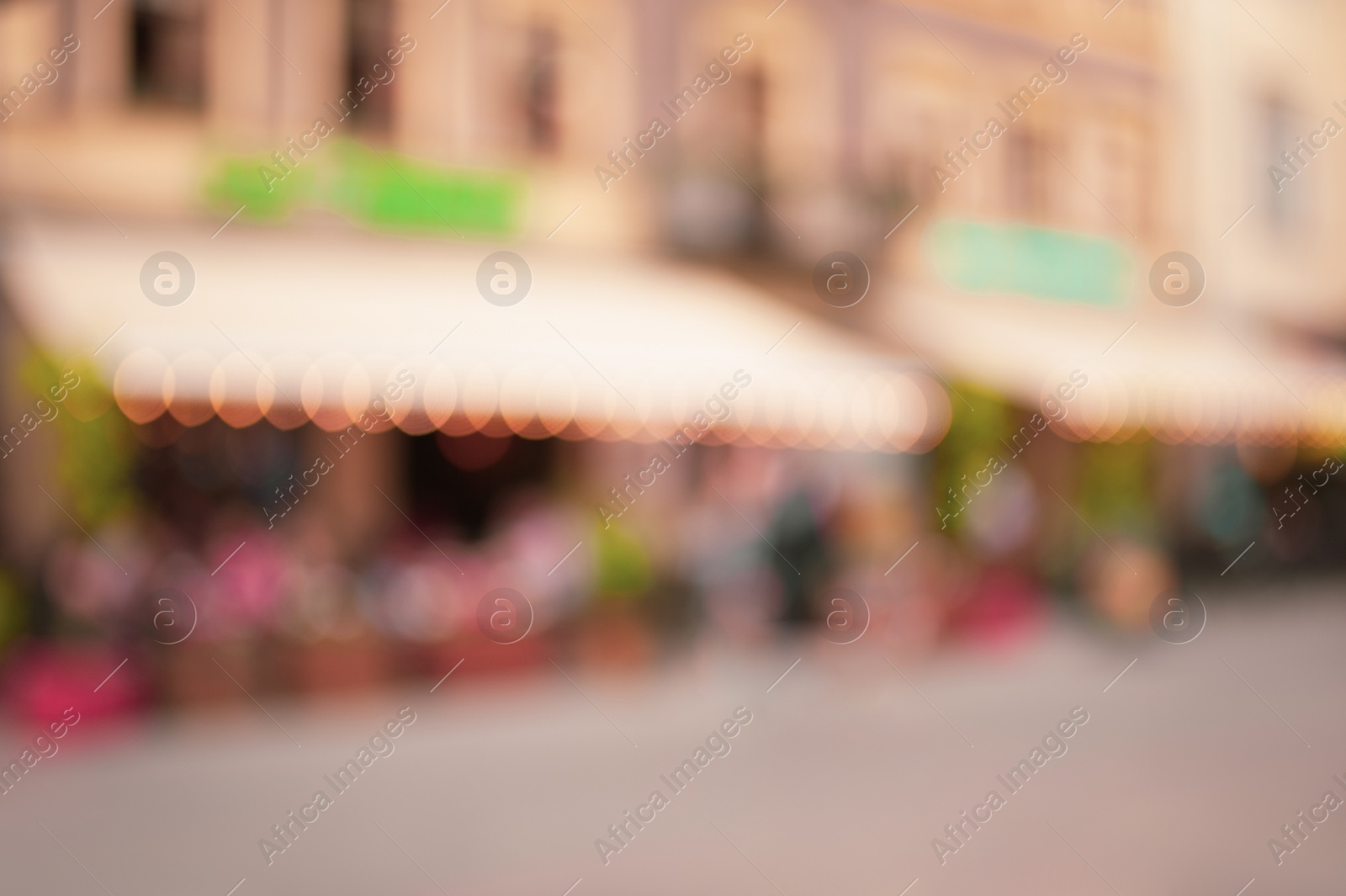 Photo of Blurred view of cafe with outdoor terrace