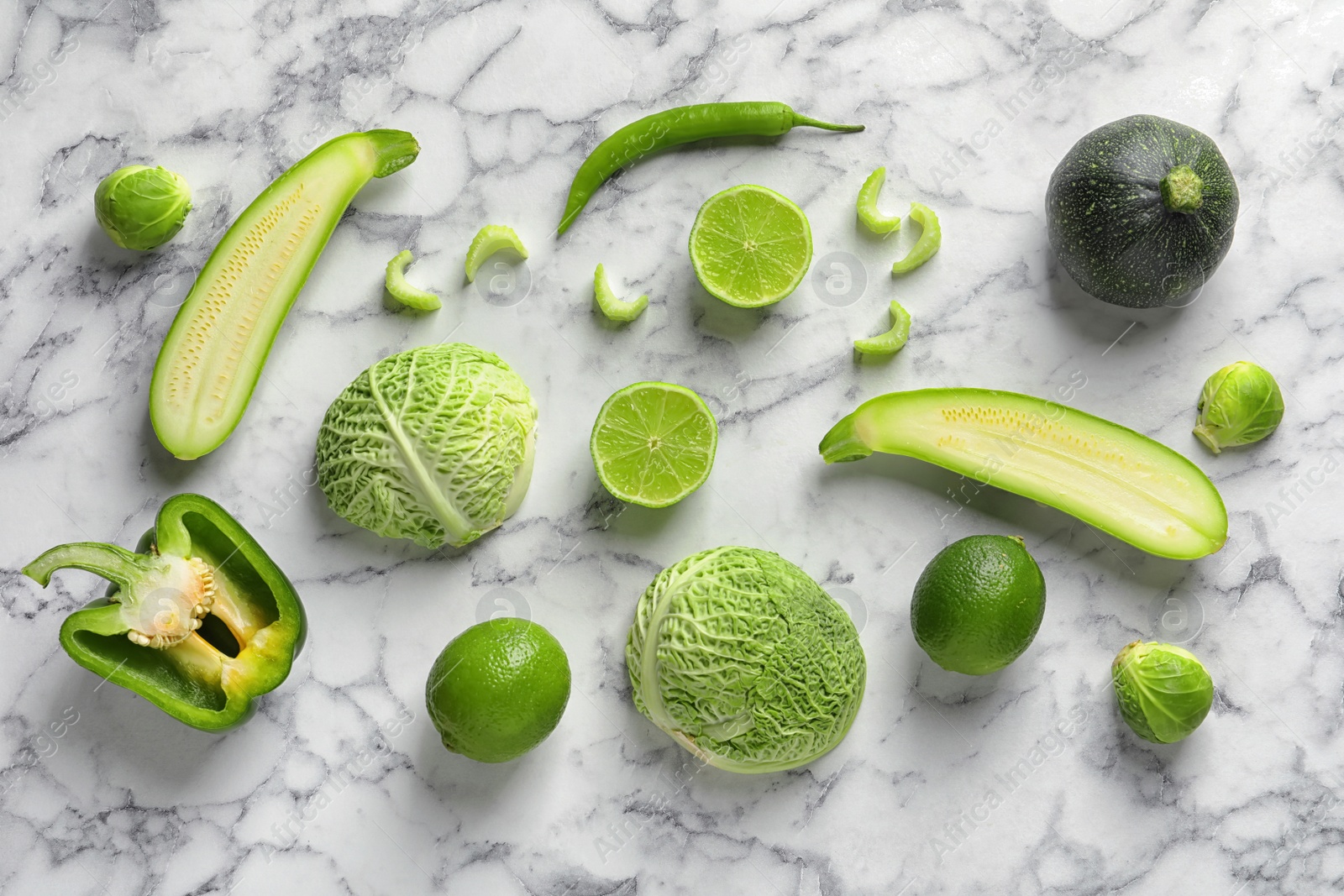 Photo of Flat lay composition with fresh vegetables and fruit on marble background