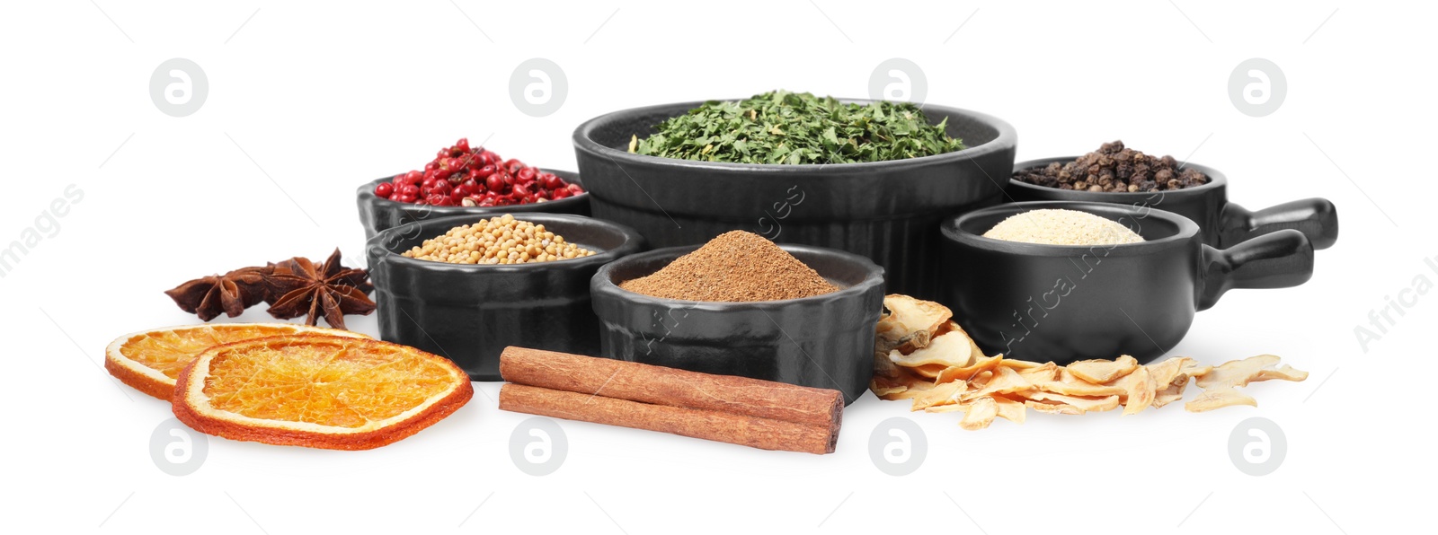 Photo of Bowls with different spices on white background