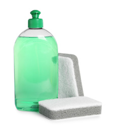 Photo of Bottle of detergent and sponges on white background