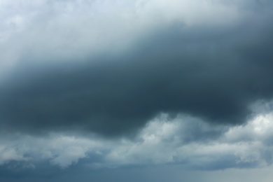 Photo of Sky with heavy rainy clouds on grey day