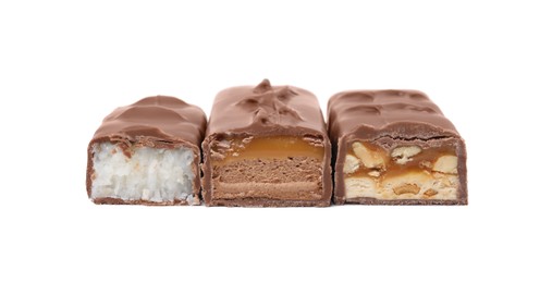 Photo of Pieces of different tasty chocolate bars on white background
