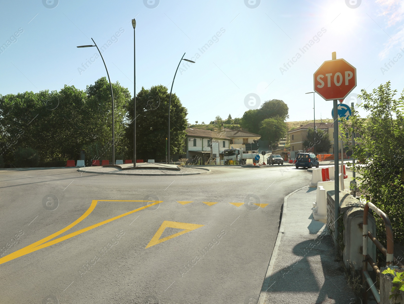 Photo of Road sign STOP outdoors on sunny day