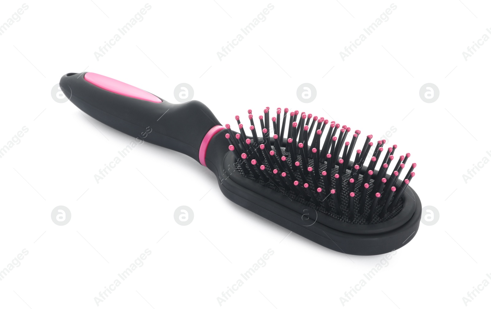 Photo of New modern hair brush isolated on white