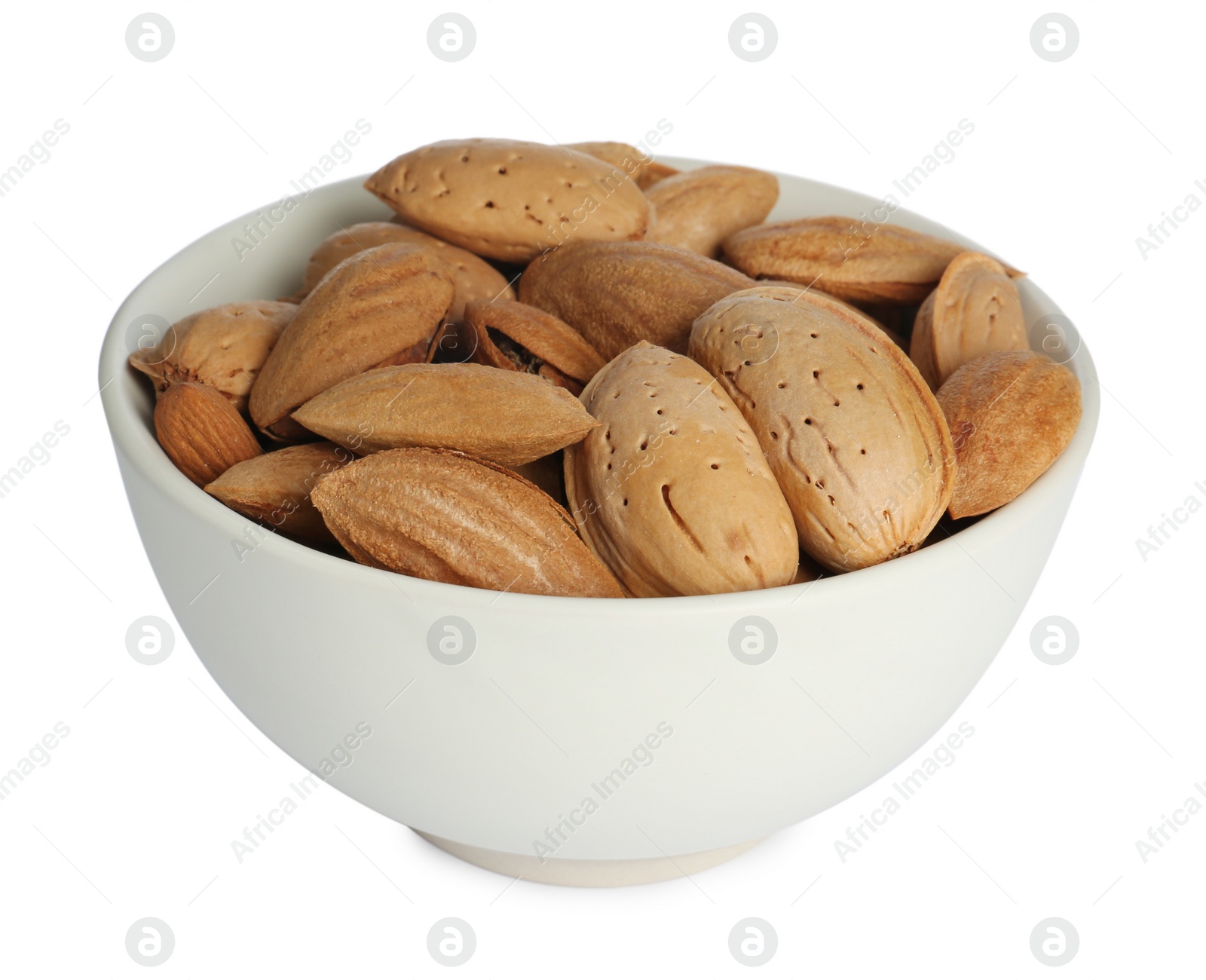 Photo of Ceramic bowl with almonds isolated on white. Cooking utensil