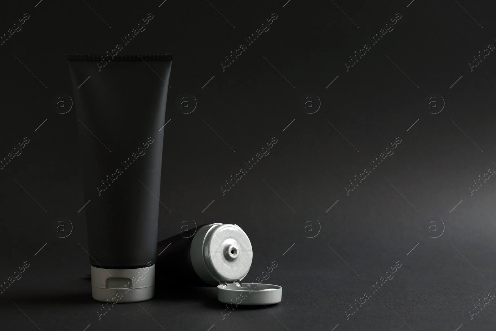 Photo of Set of men's cosmetic on black background. Space for design