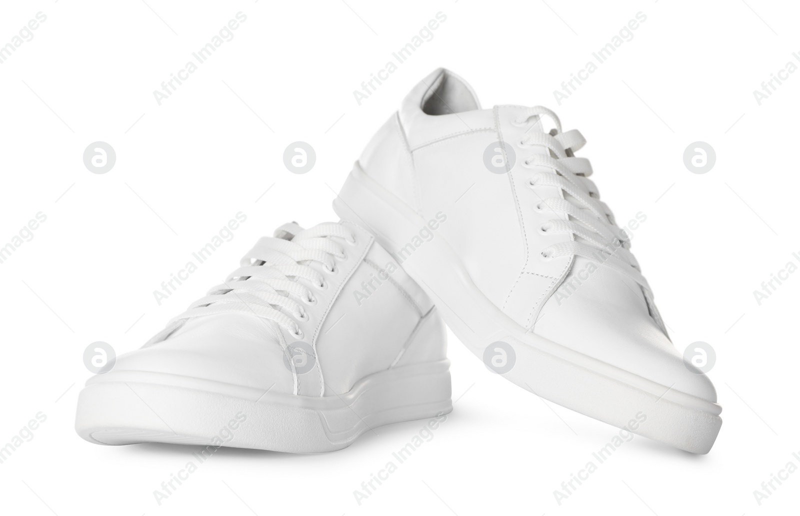 Photo of Pair of stylish sneakers isolated on white